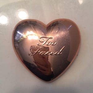 Too faced prismatic highlighter.